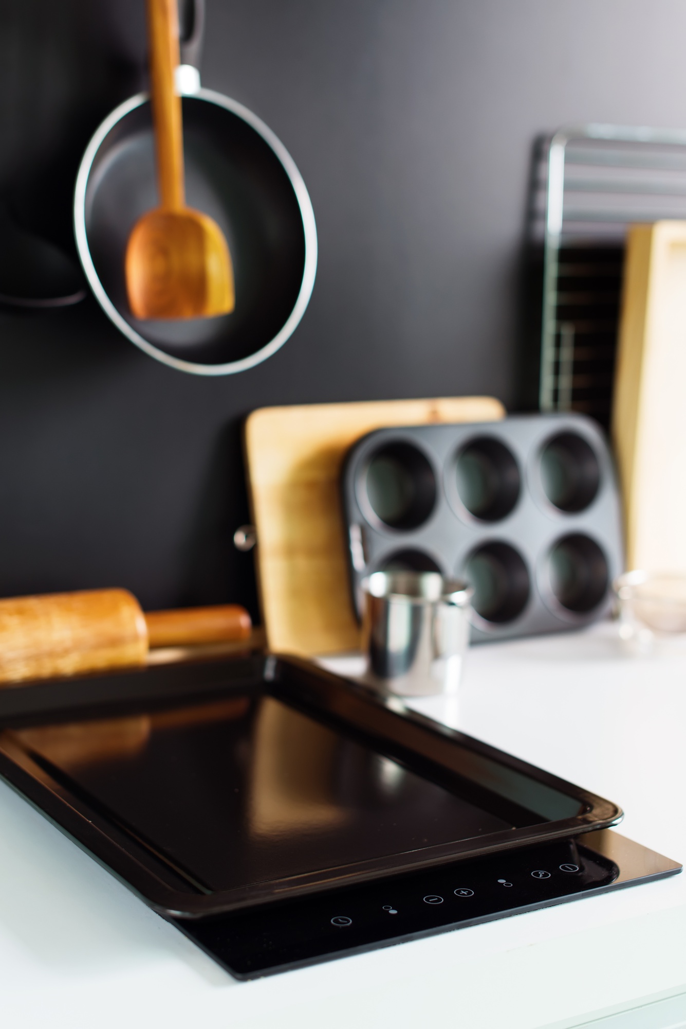 Modern kitchen workspace with stove and utensils