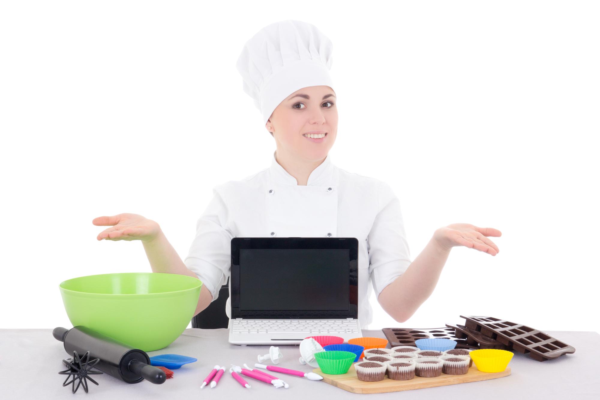 Chef teaching an online class in a modern kitchen